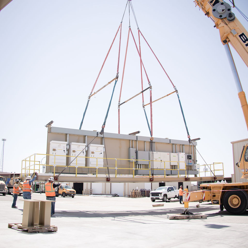Mechanical crane lifting a switch rack
